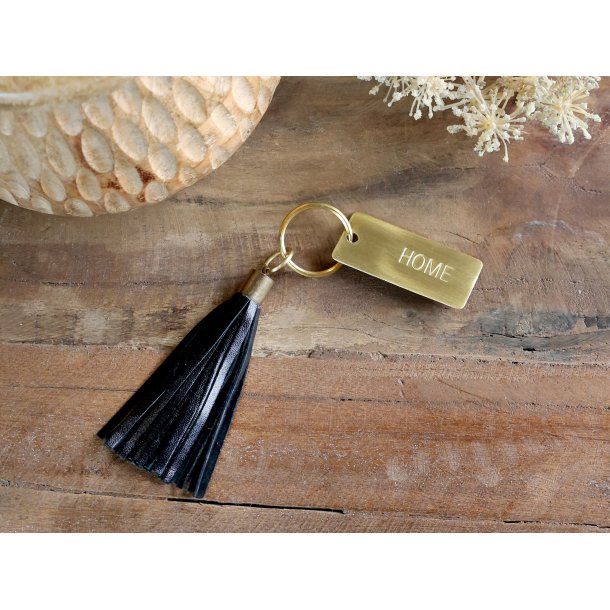 N�glering i sort l�der Home